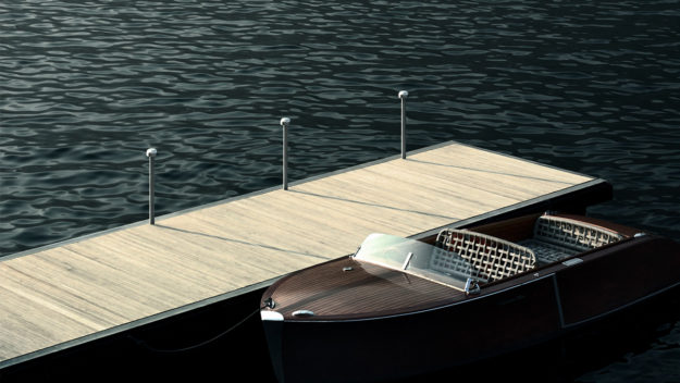 FLOS Architectural Outdoor Bellhop Bollard placed at a small boat dock