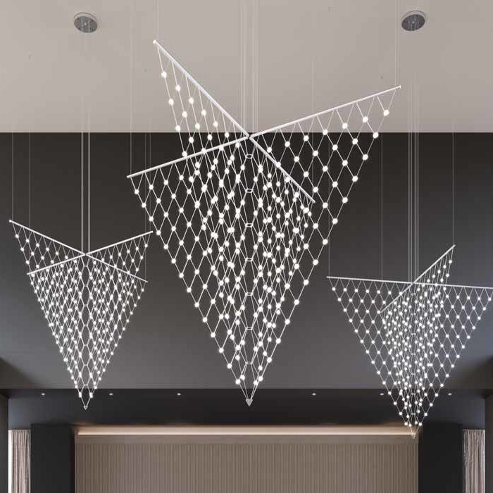 Sonneman Arrow chandelier hanging in a foyer